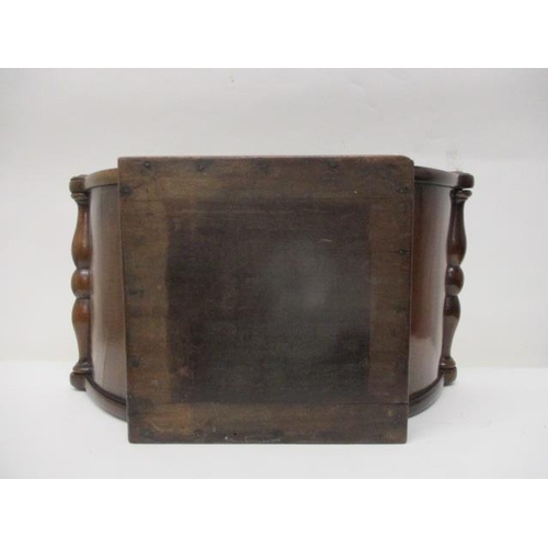 272 - A George III mahogany cheese coaster with turned handles, on a rectangular base, 7