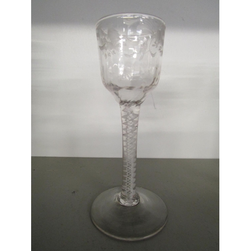 302 - A group of five Georgian opaque twist drinking glasses, to include an ovoid bowl wine glass with flu... 