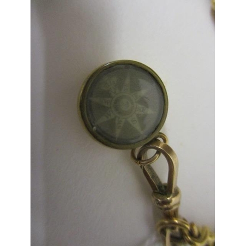 83 - WITHDRAWN  A gold coloured metal fancy link watch chain with a miniature compass, 37g total weight