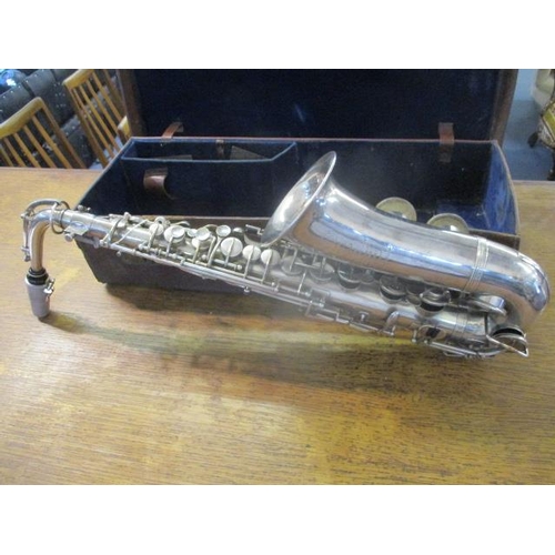 98 - A 1920s Jerome Thibouville - Lamy, silver plated saxophone in a brown leather, fitted carrying case