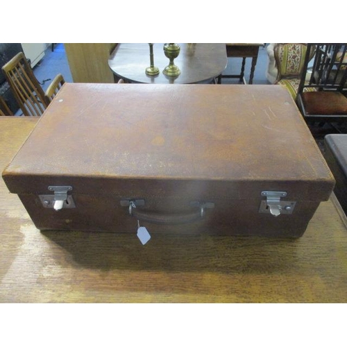 99 - A 1930s brown leather gentleman's fitted suitcase with locks, a buckled, fold over panel to the lid ... 