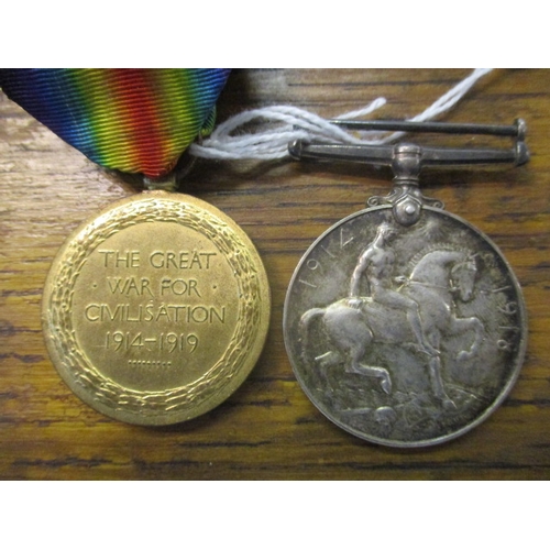 304 - Two WWI medals, a Victory and a British War, both inscribed 1251481 GNR HL Robinson CFA