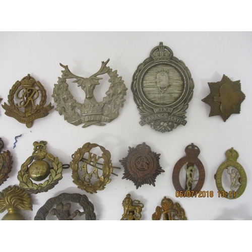 124 - Fifty military badges to include Prince of Wales Vols, Training Corps, WAAG and others