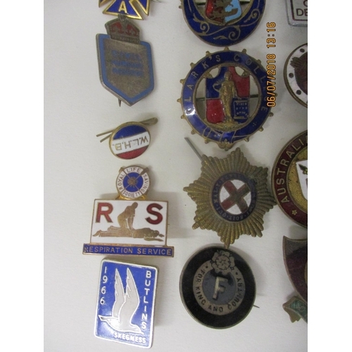 123 - Fifty Military and other enamelled and metal badges to include WVS Civil Defence, Australian Branch ... 