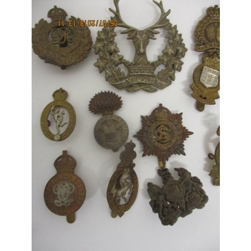 124 - Fifty military badges to include Prince of Wales Vols, Training Corps, WAAG and others