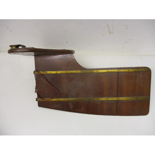 114 - A 1940s mahogany and brass racing rowing boat, rudder inscribed 'Lady Margaret Boat 1949 Thames Chal... 