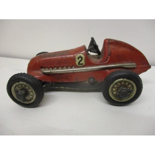 16 - A Schuco tin plated, red Mercedes toy racing car No 1050, wind-up mechanism, 5 1/2