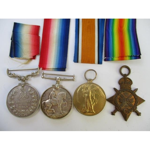 286 - A group of four WW1 medals, a Victory, a British War, a 1914-15 Star and a Bravery In the Field, eac... 