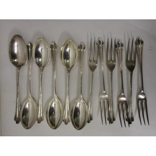 294 - A set of six Victorian silver table forks and spoons by Elkington & Co Ltd, Birmingham 1887 with flu... 