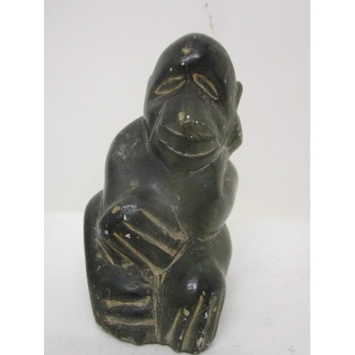 297 - Takawira - a carved green soapstone model of a monkey, signed to the base, 3 1/2