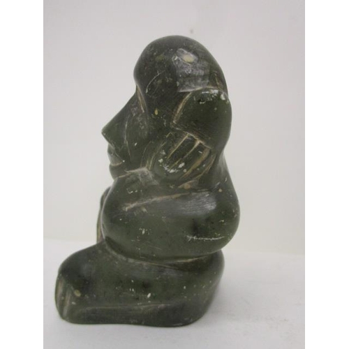 297 - Takawira - a carved green soapstone model of a monkey, signed to the base, 3 1/2