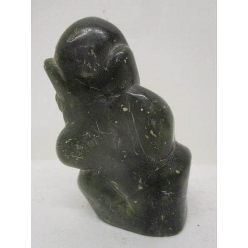 297 - Takawira - a carved green soapstone model of a monkey, signed to the base, 3 1/2