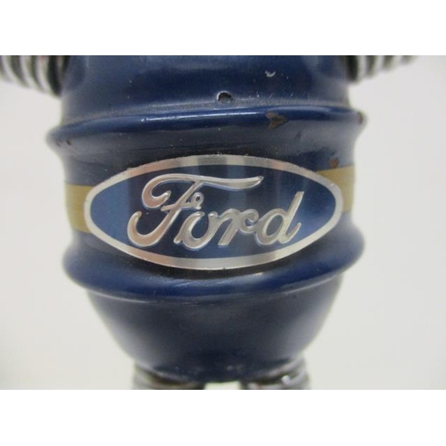 26 - A 1950s/60s Ford motor car showroom model of an alien in blue and chrome with a badge, on a splayed ... 