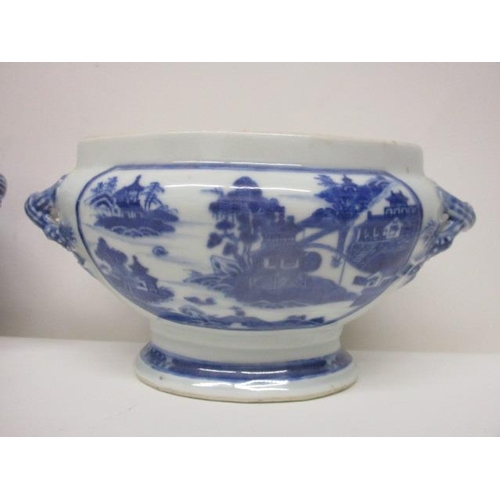 79 - A pair of mid 18th century Chinese blue and white oval tureens with twin crossover handles on a spla... 