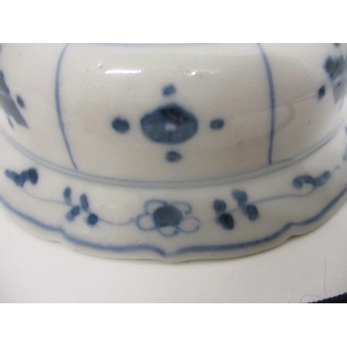 85 - A 19th century, possibly Chinese blue and white bowl decorated with a cricket and flowers and panels... 