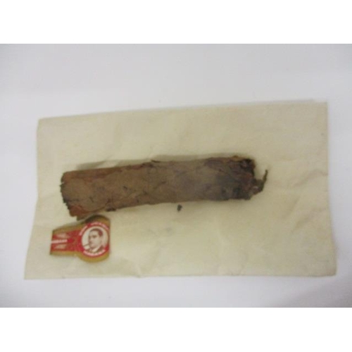 91 - Half a cigar smoked by Sir Winston Churchill in 1953 at Hatfield House, with a letter of provenance,... 