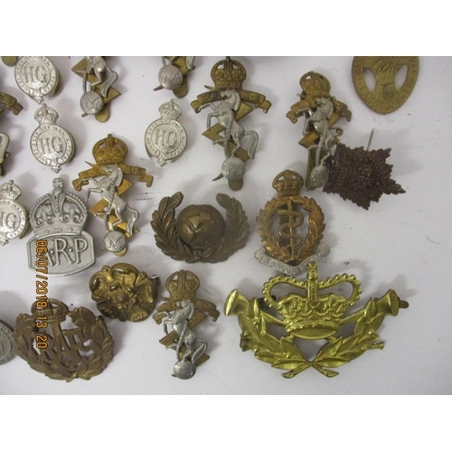 122 - Fifty mainly military badges to include RAF, The Boys Brigade, ARP and others