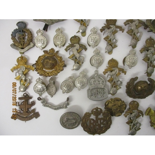 122 - Fifty mainly military badges to include RAF, The Boys Brigade, ARP and others