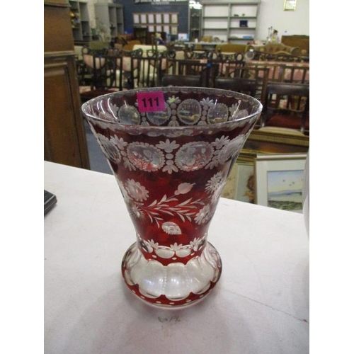 111 - A Bohemian style vase with cut floral decoration