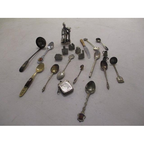 112 - A small selection of silver plate to include collectible spoons, lead figures and a silver vesta cas... 