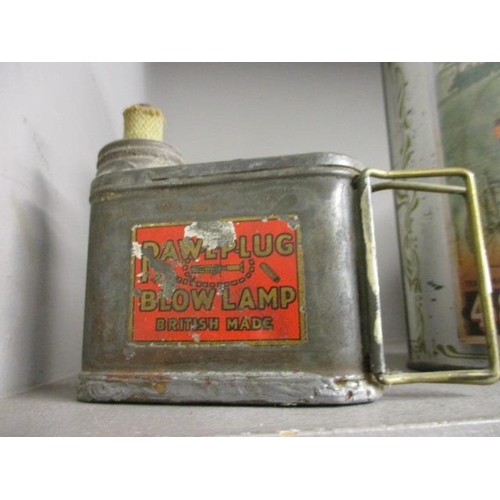 113 - A vintage motoring Adooids piston oil tin, a vintage Dunlop tennis ball canister including two tenni... 