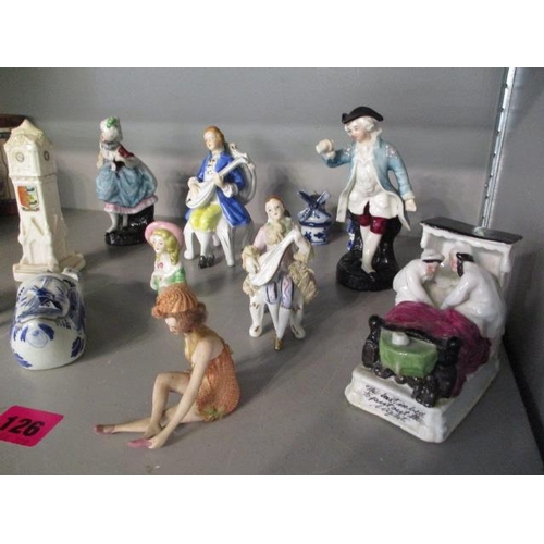 126 - A mixed lot of porcelain figures