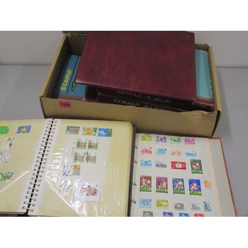 189 - Eight stamp albums (one empty) containing mixed stamps from around the world