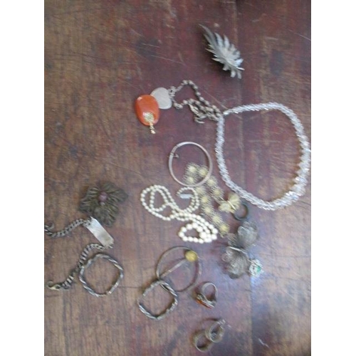 66 - A silver and yellow metal and costume jewellery to include earrings, pendants, necklaces, inset broo... 