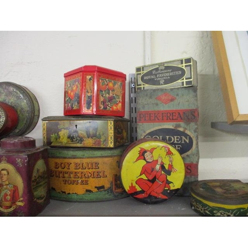 79 - A quantity of vintage tins to include biscuit tins, commemorative tins and late 20th Century tobacco... 