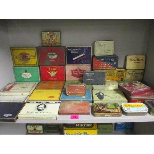 97 - A large quantity of vintage slimline cigarette tins to include Players Navy Cut, Sarony, Mitchell's,... 