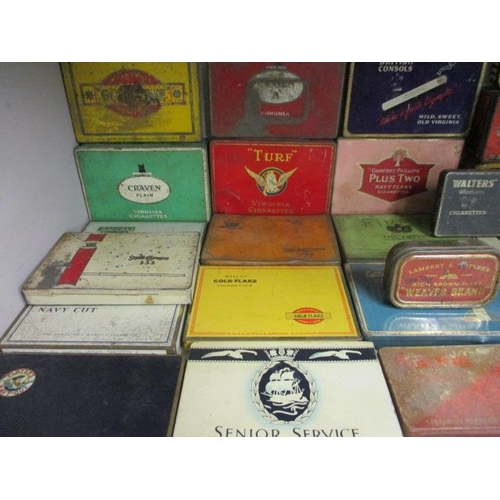 97 - A large quantity of vintage slimline cigarette tins to include Players Navy Cut, Sarony, Mitchell's,... 