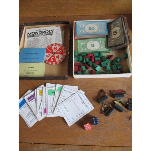 248 - Circa 1950 to 1980, games to include Travel Monopoly and bone dominos