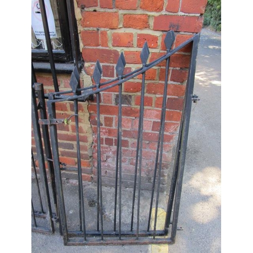 254 - A pair of wrought iron black painted drive way gates and a pair of matching smaller gates