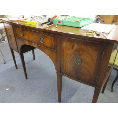 368 - A reproduction bow fronted sideboard with central cutlery drawer flanked by cupboards