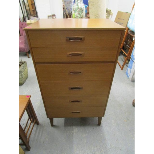 445 - Circa 1970, a retro G-Plan style chest of six graduated drawers on short square tapering legs, 45 5/... 