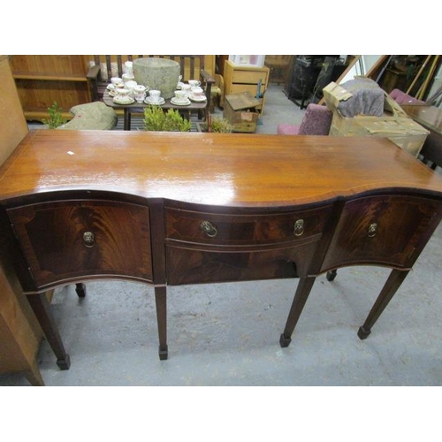 446 - A reproduction mahogany serpentine fronted sideboard, 36