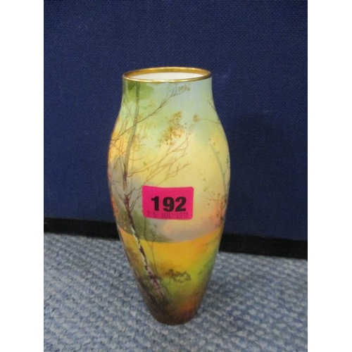 192 - A Royal Doulton china vase decorated with a landscape, 8 1/4