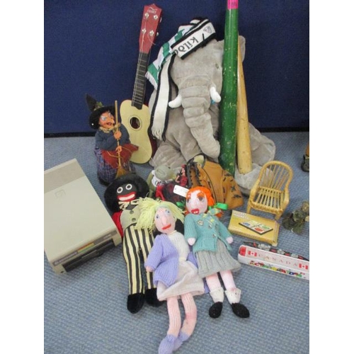 195 - Two baseball bats, an over-sized elephant soft toy, a vintage Golly rag doll, a retro Match box Sea ... 