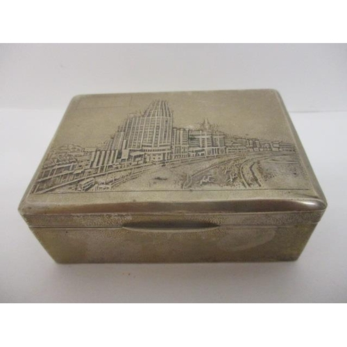 162 - An early 20th century Chinese silver cigarette box by Suikee with textured decoration, the lid embos... 