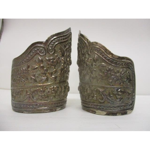 163 - A pair of Chinese silver cuff bracelets embossed and chased with flowers and foliage, stamped China ... 