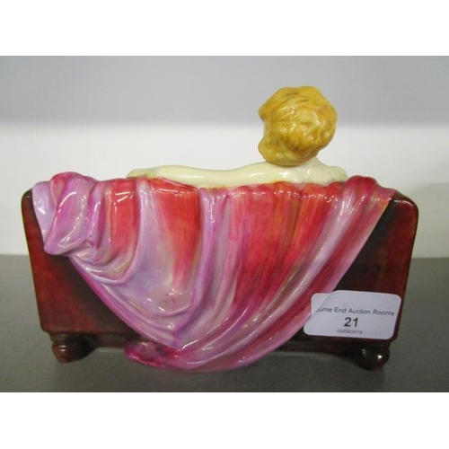 21 - Leslie Harradine for Royal Doulton - Siesta HN1305, a nude figurine of a woman reclining on a red so... 