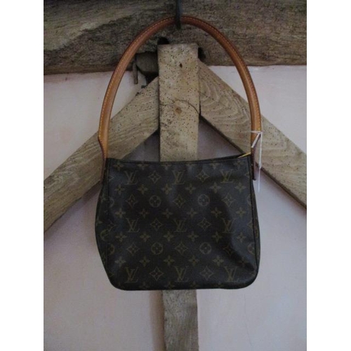 91 - Louis Vuitton - a looped MM monogram shoulder tote bag, France code SD0042, 2002, leather with alcan... 