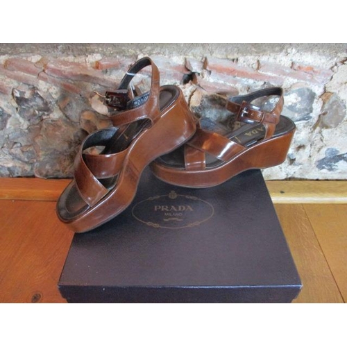 92 - Prada - a pair of ladies brown leather wedge, open toe sandals, European size 40, boxed