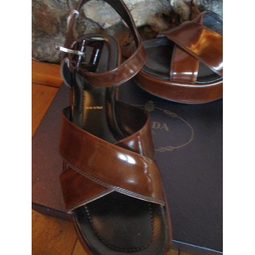 92 - Prada - a pair of ladies brown leather wedge, open toe sandals, European size 40, boxed