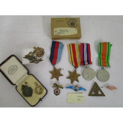 130 - A WWII four medal campaign group comprising 1939-45 Star, Africa Star, British War medal and Defence... 