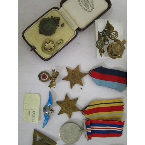 130 - A WWII four medal campaign group comprising 1939-45 Star, Africa Star, British War medal and Defence... 