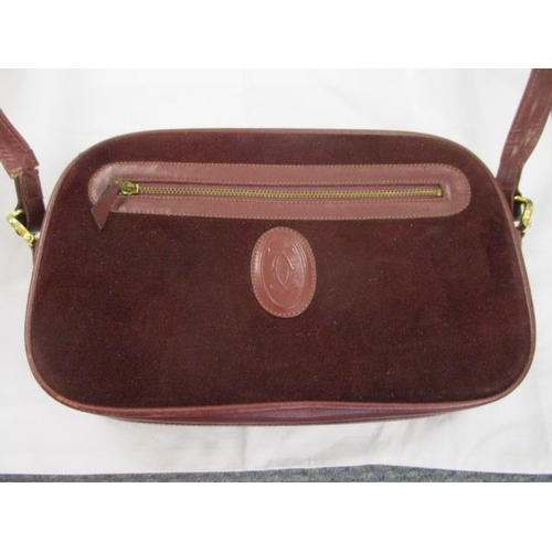 73 - A vintage Cartier ladies shoulder bag in blood red leather and suede A/F, with original box