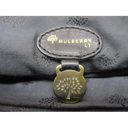 80 - A Mulberry Lily black shoulder bag with lacquered brass hardware, postman's lock fastening, padlock ... 