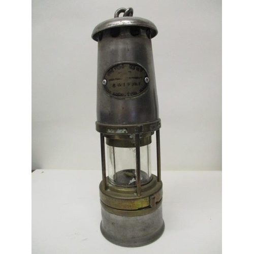 180 - A The Wolf Safety Lamp Co ( W M Maurice) Ltd Type 7RMBS, polished steel and brass miners safety lamp... 