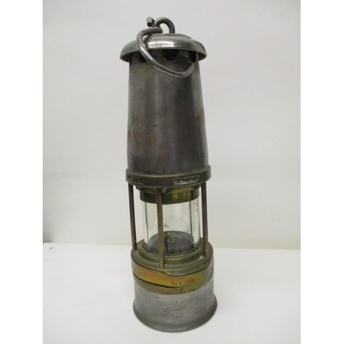 180 - A The Wolf Safety Lamp Co ( W M Maurice) Ltd Type 7RMBS, polished steel and brass miners safety lamp... 